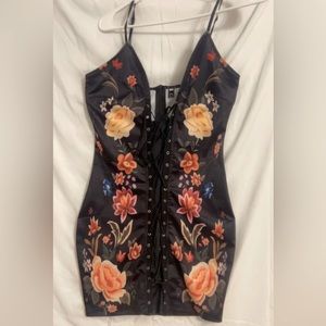 Sexy black dress with flowers, size small, stretchy.